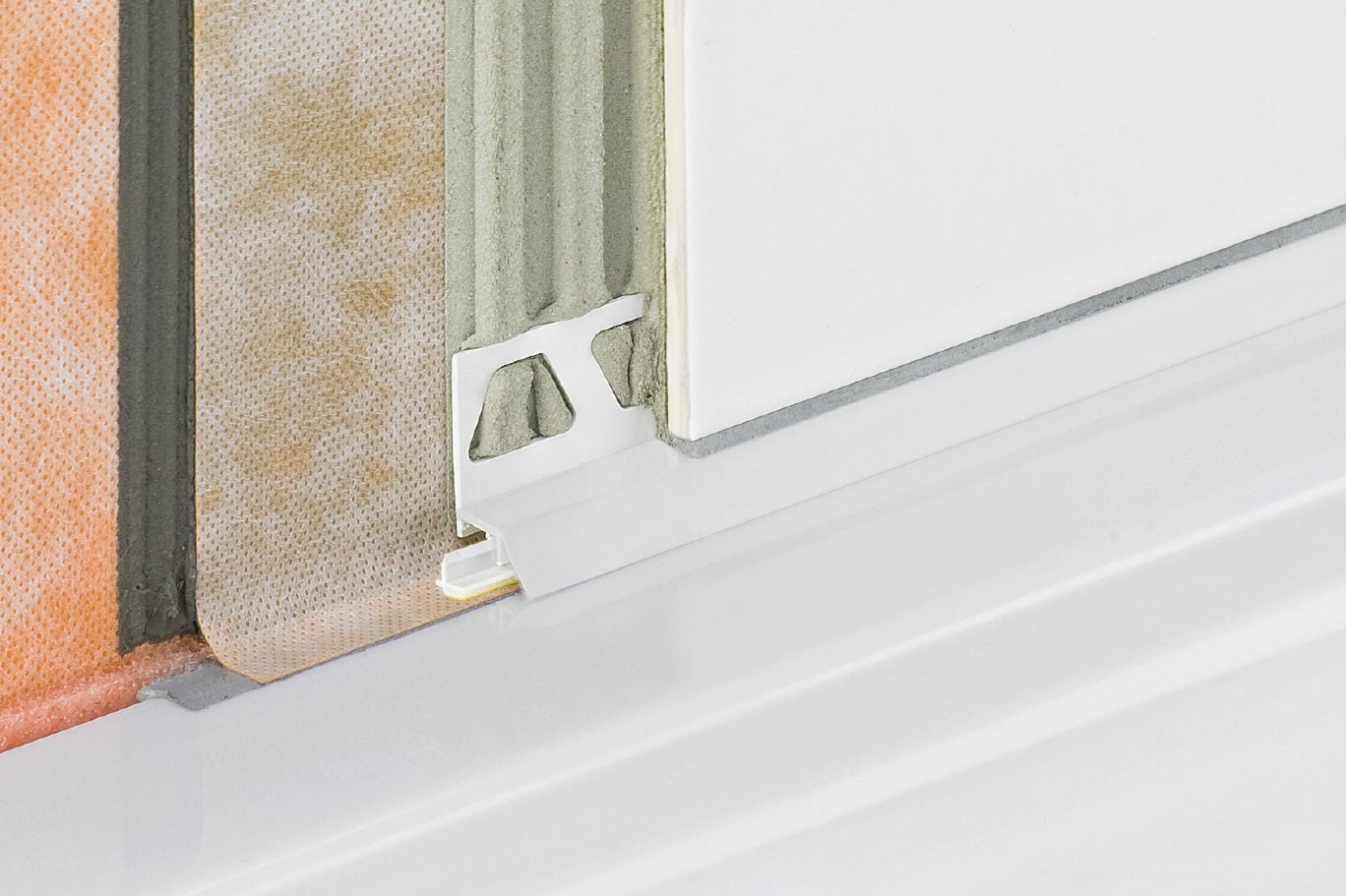Schluter DILEX-AS profilé joint périmétral PVC blanc éclatant 8' (2-1/2) avec ailette d'ancrage et ruban adhésif